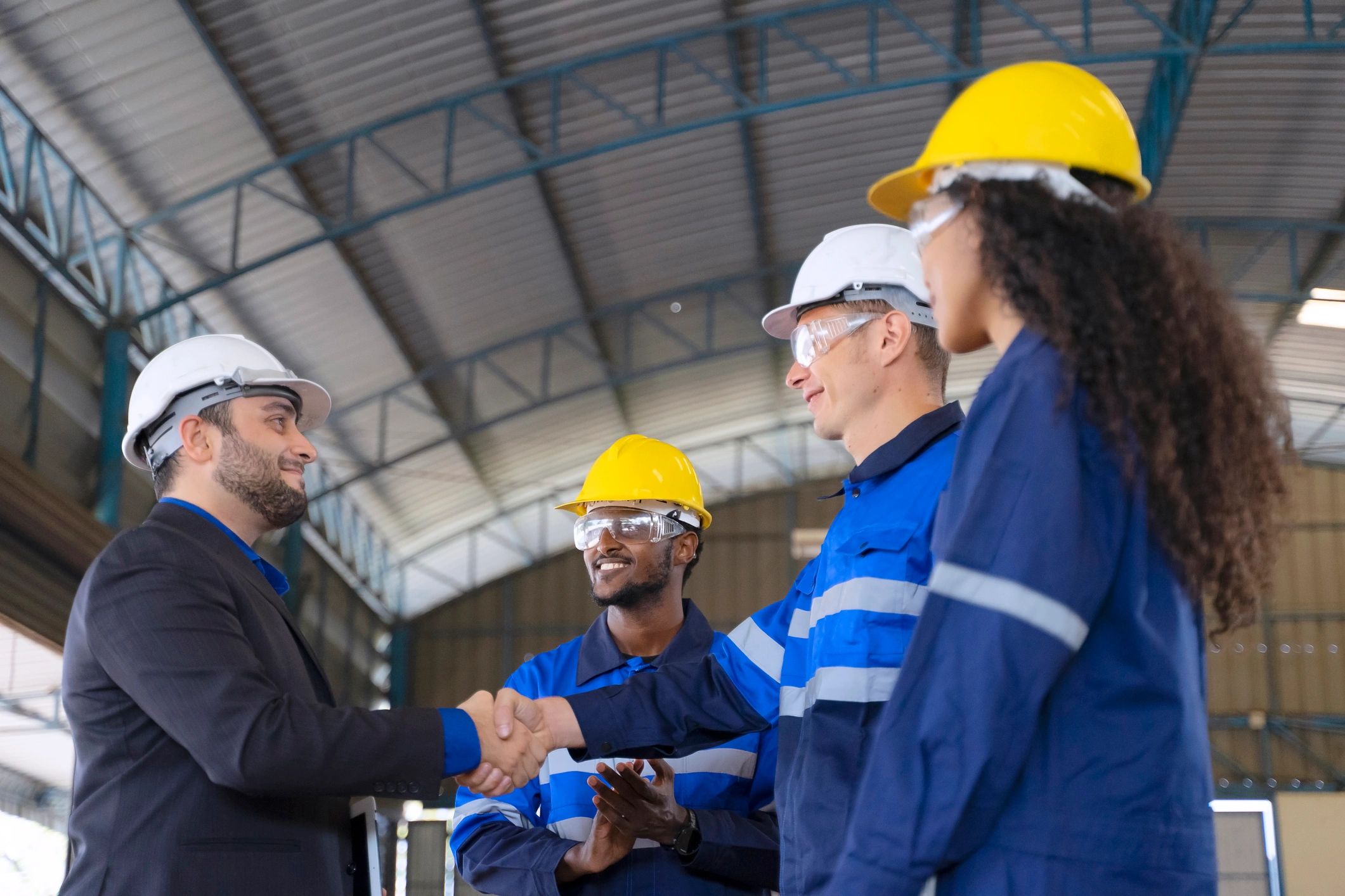 Industrial engineering team reviewing technical operations